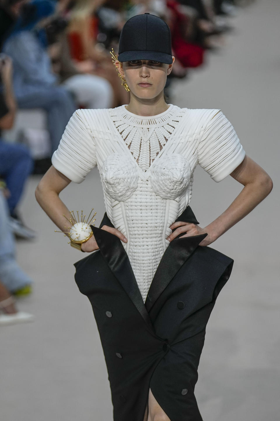 A model wears a creation as part of Jean Paul Gaultier's Haute Couture Fall/Winter 2022-2023 fashion collection presented Wednesday, July 6, 2022 in Paris. (AP Photo/Michel Euler)