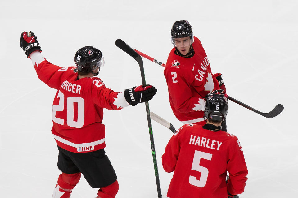 EDMONTON, AB - JANUARY 04: Dawson Mercer #20, Braden Schneider #2 and Thomas Harley #5 of Canada celebrate a goal against Russia during the 2021 IIHF World Junior Championship semifinals at Rogers Place on January 4, 2021 in Edmonton, Canada. (Photo by Codie McLachlan/Getty Images)