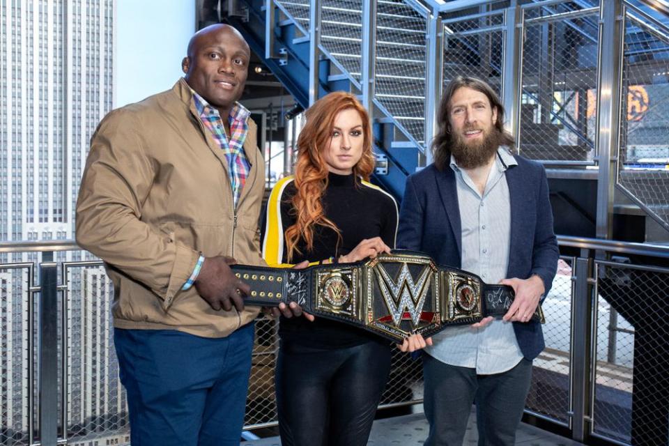 WWE Superstars Bobby Lashley, Becky Lynch and Daniel Bryan | Santiago Felipe/Getty Images