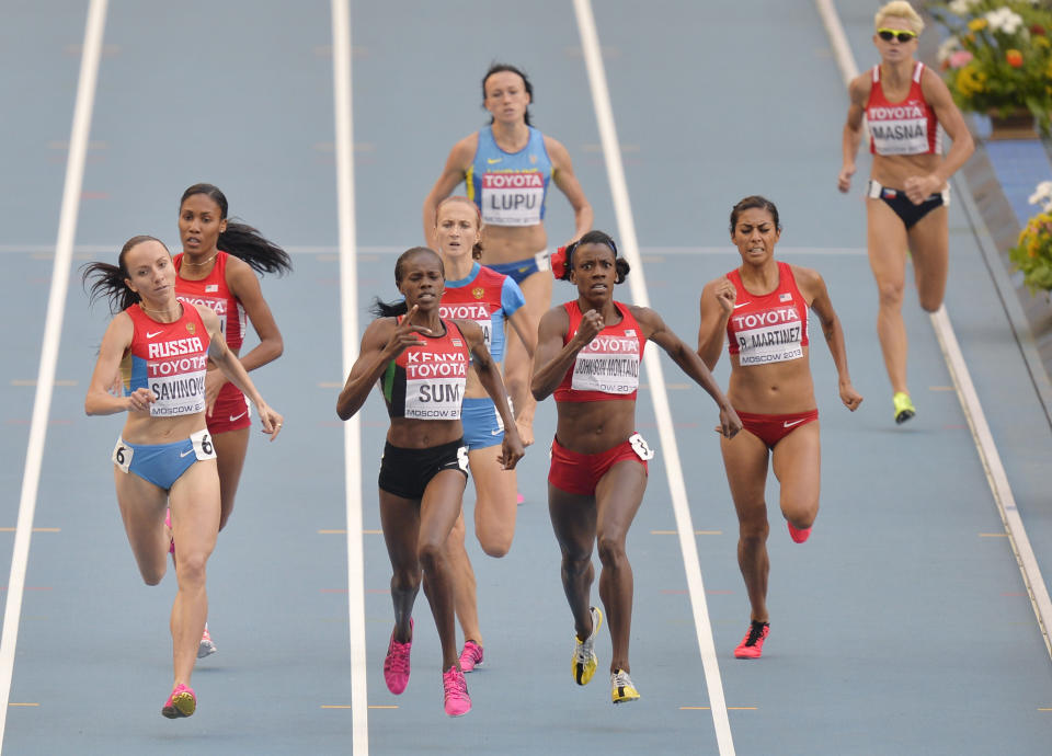 FILE _ In this Aug. 18, 2013, file photo, from front left to right, Russia's Mariya Savinova, Kenya's Eunice Jepkoech Sum, United States' Alysia Johnson Montano and United States' Brenda Martinez compete in the women's 800-meter final at the World Athletics Championships in the Luzhniki stadium in Moscow, Russia. Montano will receive bronze medals she was cheated out of by Savinova who finished ahead of her at the 2011 and 2013 world championships but was later disqualified for doping. (AP Photo/Martin Meissner, File)
