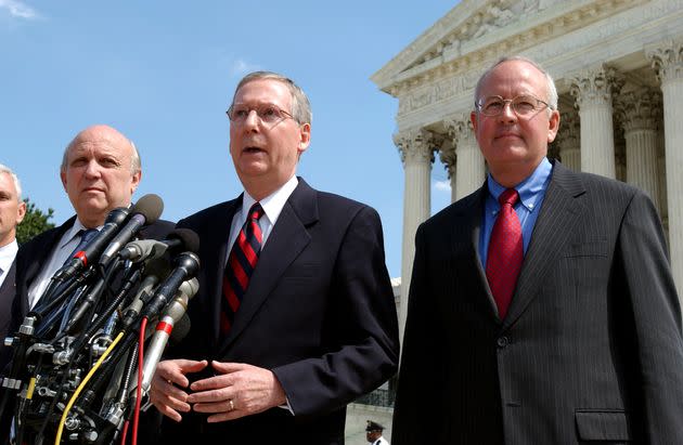 McConnell and his legal team speak to the press after arguments before the Supreme Court in McConnell vs. FEC.