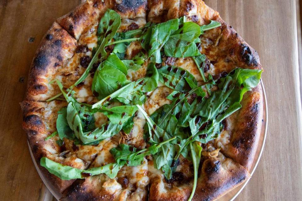 The Umami Mama made with local chicken, bacon, mozzarella, caramelized onions and fresh arugula and Kalamata olives at Locals Food Hub & Pizza Pub in Frankfort, Ky., June 16, 2023.