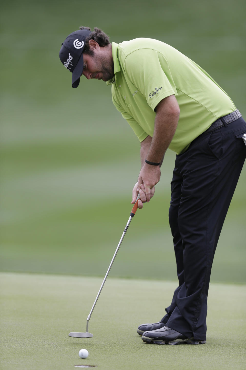 Steven Bowditch, of Australia, makes a birdie putt on the 18th hole during the second round of the Valero Texas Open golf tournament, Friday, March 28, 2014, in San Antonio. (AP Photo/Eric Gay)