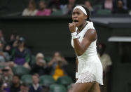 Coco Gauff of the US celebrates after beating Romania's Mihaela Buzarnescu in a second round women's singles match on day four of the Wimbledon tennis championships in London, Thursday, June 30, 2022. (AP Photo/Kirsty Wigglesworth)