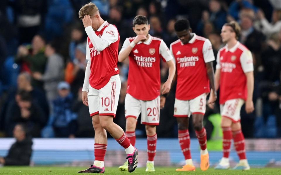 Arsenal's players after losing away at Man City - Arsenal are in danger of one of the all-time Premier League title chokes - Getty Images/Michael Regan