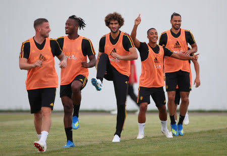 Soccer Football - World Cup - Belgium Training - Sochi, Russia - June 16, 2018 Belgium's Marouane Fellaini with Toby Alderweireld and team mates during training REUTERS/Hannah McKay