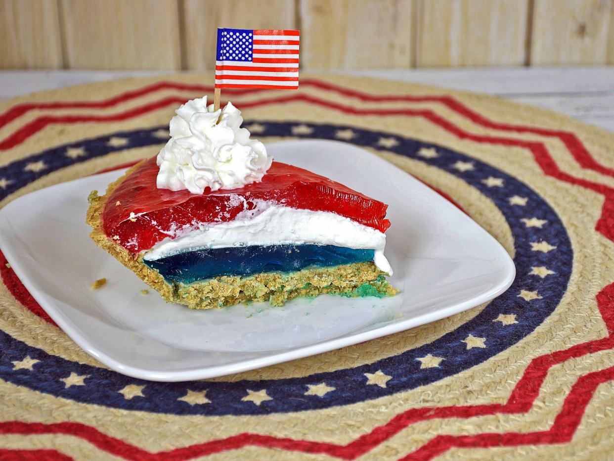 red and blue jello pie with whipped cream and American flag