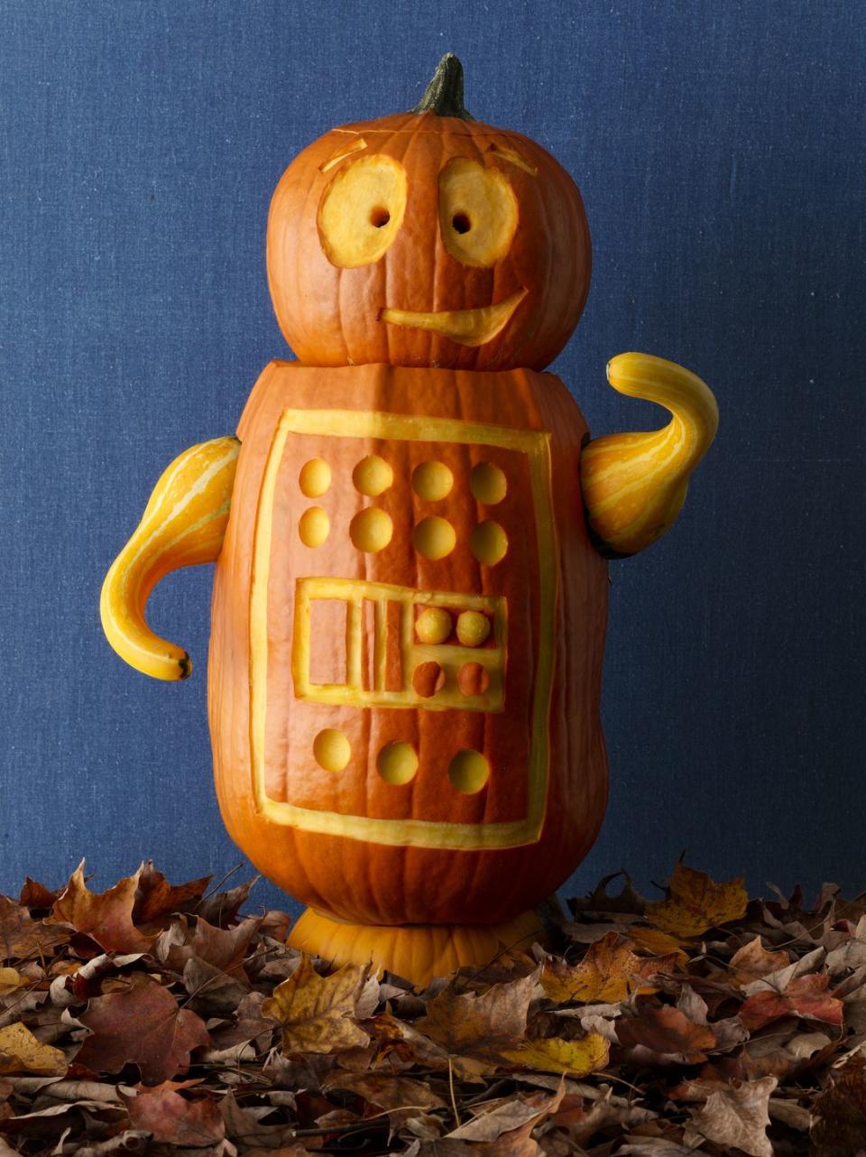 <p>We can't stop smiling at this little robot. Minimal carving is needed, which is a plus if you want to make more than one. Hint: A melon baller will make creating all those little "buttons" so much easier. </p>