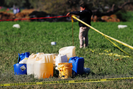 Fuel canisters are seen at the site where a fuel pipeline ruptured by suspected oil thieves exploded, in the municipality of Tlahuelilpan, state of Hidalgo, Mexico January 19, 2019. REUTERS/Henry Romero