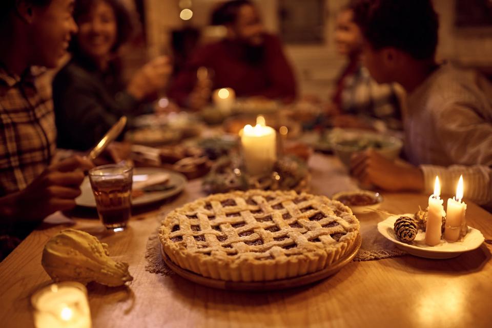 A holiday dinner with a close up of a pie