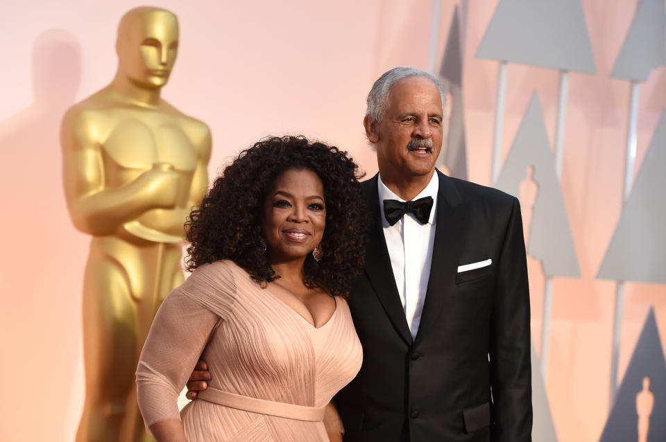 Oprah Winfrey, left, and Stedman Graham arrive at the Oscars on Sunday, Feb. 22, 2015, at the Dolby Theatre in Los Angeles. (Photo by Jordan Strauss/Invision/AP)