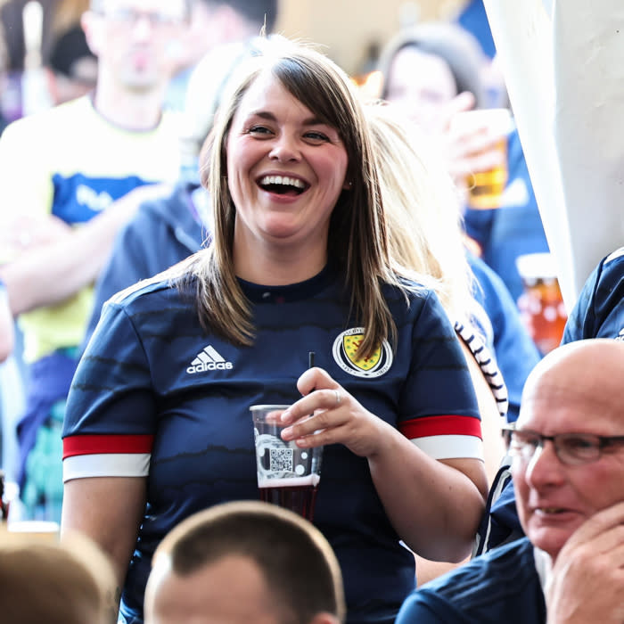 GLASGOW, SCOTLAND - SEPTEMBER 12: A Scotland fan in the Saltire Square during the 150th Anniversary Heritage Match between Scotland and England at Hampden Park, on September 12, 2023, in Glasgow, Scotland.  (Photo by Ross MacDonald / SNS Group)