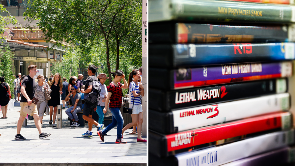 A group of people walking on the street and a stack of DVDs to represent people working in the movie rental industry.