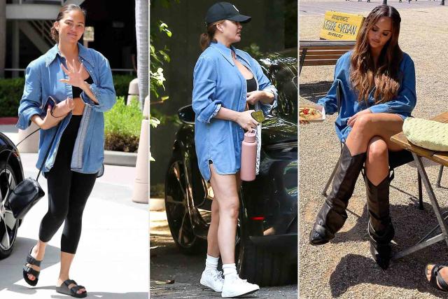 Chrissy Teigen wearing Blue Denim Jacket, Grey Long Sleeve T-shirt