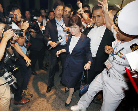 Japan's Defence Minister Tomomi Inada is surrounded by the media as she leaves the Defence Ministry in Tokyo, Japan in this photo taken by Kyodo on July 27, 2017. Mandatory credit Kyodo/via REUTERS