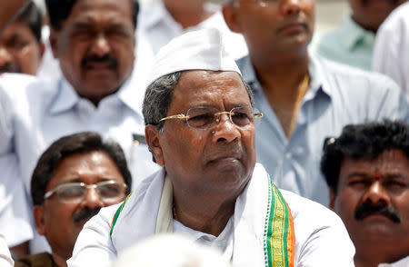 Outgoing Chief Minister of the southern state of Karnataka Siddaramaiah attends a protest against India's ruling Bharatiya Janata Party (BJP) leader B.S. Yeddyurappa's swearing-in as Chief Minister of the southern state of Karnataka, in Bengaluru, India, May 17, 2018. REUTERS/Abhishek N. Chinnappa