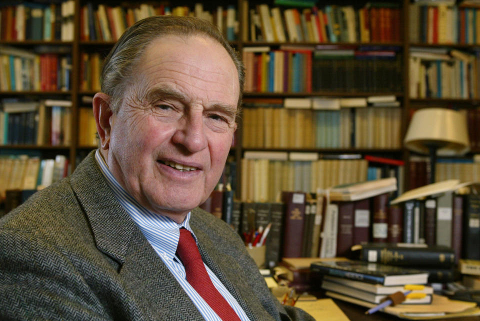 Bernard Bailyn poses in his Harvard University office in Cambridge, Mass., Feb. 26, 2003. Bailyn, one of the country’s leading historians of the early U.S., has died at age 97. Bailyn was best known for his Pulitzer Prize-winning “The Ideological Origins of the American Revolution,” among the most influential historical works of the past few decades. (AP Photo/Julia Malakie, File)