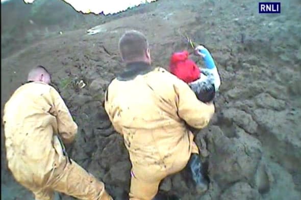 Dramatic rescue of teen girls stuck in thick mud in Kent (pics)