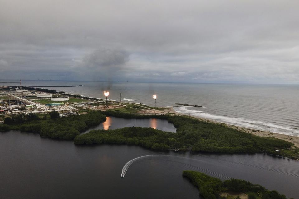 An aerial view of President Andres Manuel Lopez Obrador infrastructure projects, the Olmeca refinery in Paraiso, Mexico, Nov. 30, 2023. As president, he has pumped billions of dollars into Mexico’s indebted state oil company and has been pushing an overhaul of the country’s energy sector that has boosted fossil fuel production and stymied investment in renewable energy projects. (AP Photo/Felix Marquez)