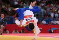 Ki-Chun Wang of Korea competes against Jaromir Jezek of Czech Republic on Day 3 of the London 2012 Olympic Games at ExCeL on July 30, 2012 in London, England. (Photo by Alexander Hassenstein/Getty Images)