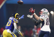 <p>Rob Gronkowski #87 of the New England Patriots tries to make a catch against Samson Ebukam #50 of the Los Angeles Rams in the second half during Super Bowl LIII at Mercedes-Benz Stadium on February 3, 2019 in Atlanta, Georgia. (Photo by Jamie Squire/Getty Images) </p>