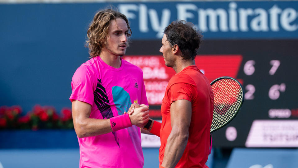 Images of championship winner Rafael Nadal of Spain shakes hands at the net with finalist Stefanos Tsitsipas of Greece on Day Seven at the Rogers Cup on August 12, 2018 in Toronto, Canada (Photo by Peter Staples/ATP World Tour via Getty Images)