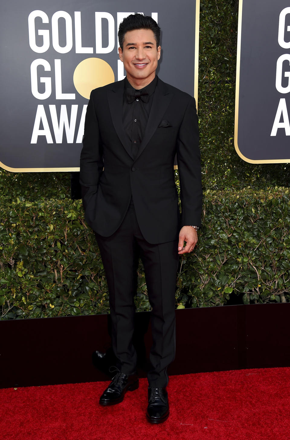 FILE - This Jan. 6, 2019 file photo shows Mario Lopez at the 76th annual Golden Globe Awards in Beverly Hills, Calif. Lopez, the host of “Access Hollywood,” apologized Wednesday, July 31, for telling conservative commentator Candace Owens that it’s “dangerous” and “alarming” for parents to honor the wishes of young children who identify with a gender other than the one assigned at birth. He said in a statement released by his publicist that his remarks were “ignorant and insensitive.” (Photo by Jordan Strauss/Invision/AP, File)