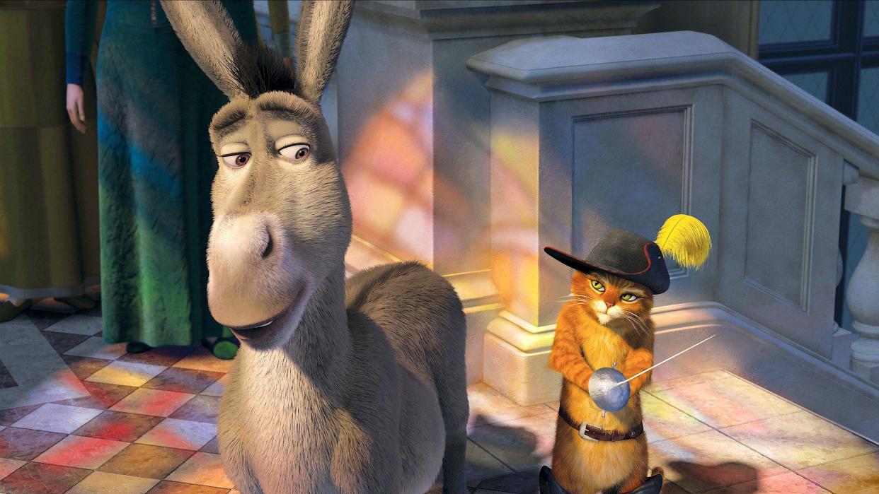 Donkey (Eddie Murphy) and Puss In Boots (Antonio Banderas) in 2007's Shrek The Third. (Dreamworks/Alamy)