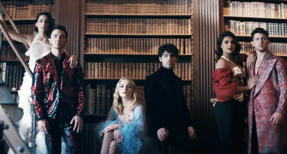 Kevin Jonas, Danielle Jonas, Sophie Turner, Joe Jonas, Nick Jonas, and Priyanka Chopra Jonas in the music video for "Sucker"