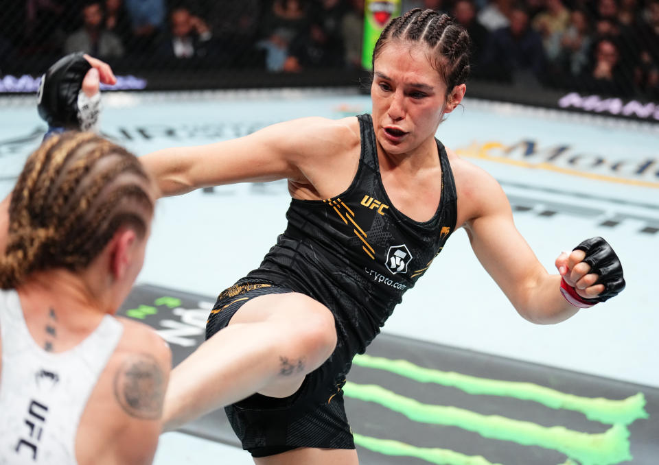 LAS VEGAS, NEVADA - SEPTEMBER 16: (R-L) Alexa Grasso of Mexico kicks Valentina Shevchenko of Kyrgyzstan in the UFC flyweight championship fight during the Noche UFC event at T-Mobile Arena on September 16, 2023 in Las Vegas, Nevada. (Photo by Chris Unger/Zuffa LLC via Getty Images)