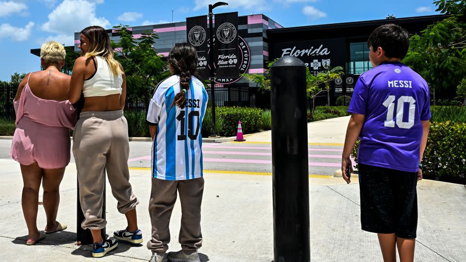 Fans of Argentine football player Lionel Messi wait for his arrival at the DRV PNK Stadium in Fort Lauderdale, Florida, on July 11, 2023. - Chandan Khanna/AFP/Getty Images