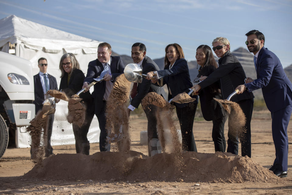 From left, Arizona Gov. Katie Hobbs, California Independent System Operator President Elliot Mainzer, Ten West Link CEO Himanshu Saxena, Vice President Kamala Harris, Interior Secretary Deb Haaland, Energy Secretary Jennifer Granholm, National Climate Advisor Ali Zaidi break ground at a ceremony for the Ten West Link transmission line, Thursday, Jan. 19, 2023, in Tonopah, Ariz. (AP Photo/Alberto Mariani)