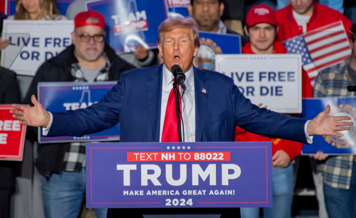 Donald Trump speaks at a campaign rally in New Hampshire on 16 December. (EPA)