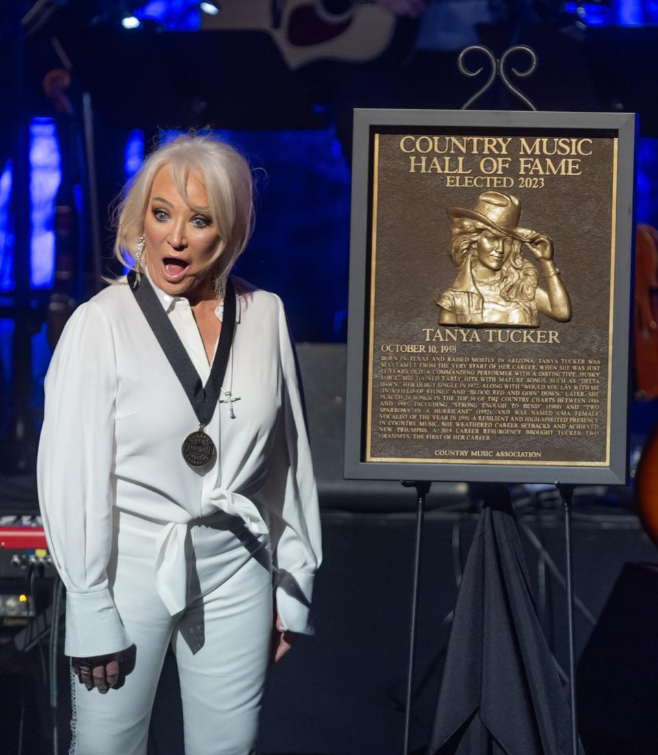 Inductee Tanya Tucker reacts as her hall of fame plaque is unveiled during the 2023 Country Music Hall of Fame induction ceremony Sunday, October 22, 2023.