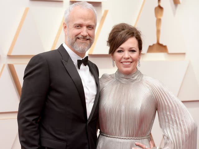 <p>Gilbert Flores/Variety/Penske Media/Getty</p> Ed Sinclair and Olivia Colman at the 94th Academy Awards on March 27th, 2022 in Los Angeles, California.