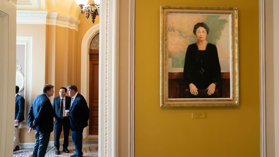 Sen. Mark Warner, Sen. Brian Schatz and Sen. Joe Manchin speak outside the Senate Chamber following passage in the House of a 45-day continuing resolution on September 30, 2023 in Washington, DC. - Nathan Howard/Getty Images