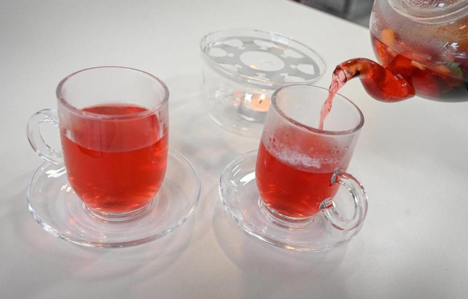 House tea, with a blend of fruit and herbs, is poured at Baklava House. now open on Bullard Avenue near West Avenue in Fresno.