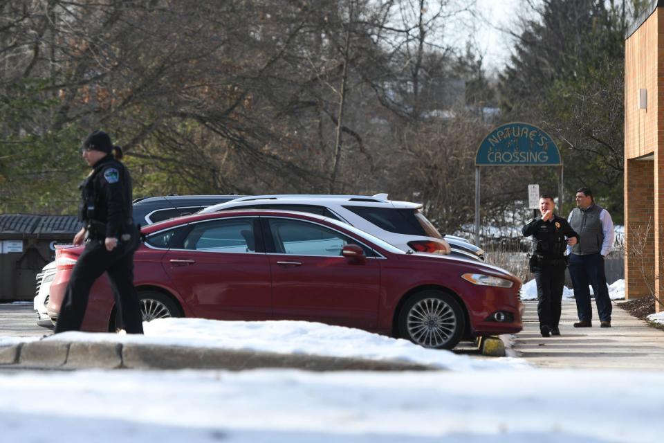 Meridian Township police officers seen at Cornell Elementary School in the Okemos school district in Meridian Township on Monday, Feb. 6, 2023.