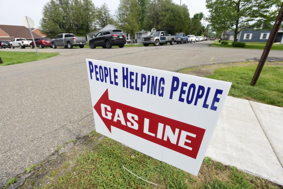 People Helping People yard sing at the Marathon gas station on Main Street in Lexington on Monday, June 6, 2022. The gas station offered $1 off per gallon beginning at 10 a.m. through People Helping People, an initiative supported through donations from local businesses.