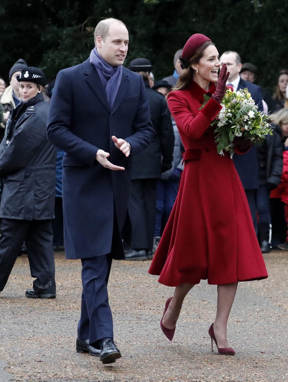 Britain's Prince William, and Kate, Duchess of Cambridge wave to the crowd after attending the Christmas day service at St Mary Magdalene Church in Sandringham in Norfolk, England, Tuesday, Dec. 25, 2018. (AP PhotoFrank Augstein)