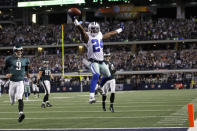 FILE PHOTO: Dallas Cowboys corner back Morris Claiborne (24) returns a fumble for a touchdown as Philadelphia Eagles quarterback Nick Foles (9) trails the play in the second half of their NFL football game in Arlington, Texas December 2, 2012. REUTERS/Mike Stone