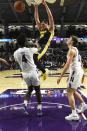 Iowa forward Ryan Kriener (15) dunks above Northwestern forward Jared Jones (4) during the second half of an NCAA college basketball game Tuesday, Jan. 14, 2020, in Evanston, Ill. (AP Photo/David Banks)