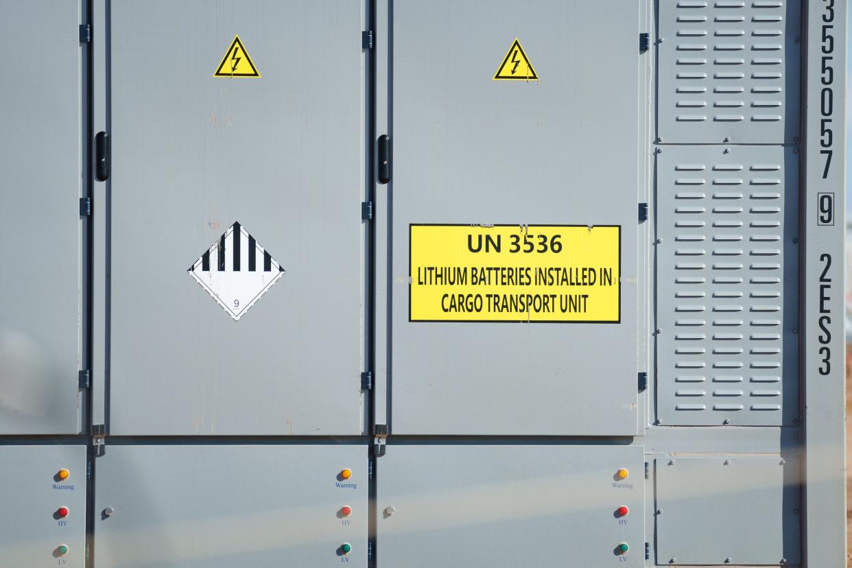 A lithium battery cargo container sits at the Sonoran Solar Project facility in Buckeye, Ariz., on Dec. 5, 2022.