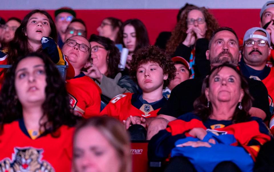 Sadness is reflected on the faces of Florida Panthers fans as they watch their team lose to the Edmonton Oilers in Game 4 of the NHL Stanley Cup Final.