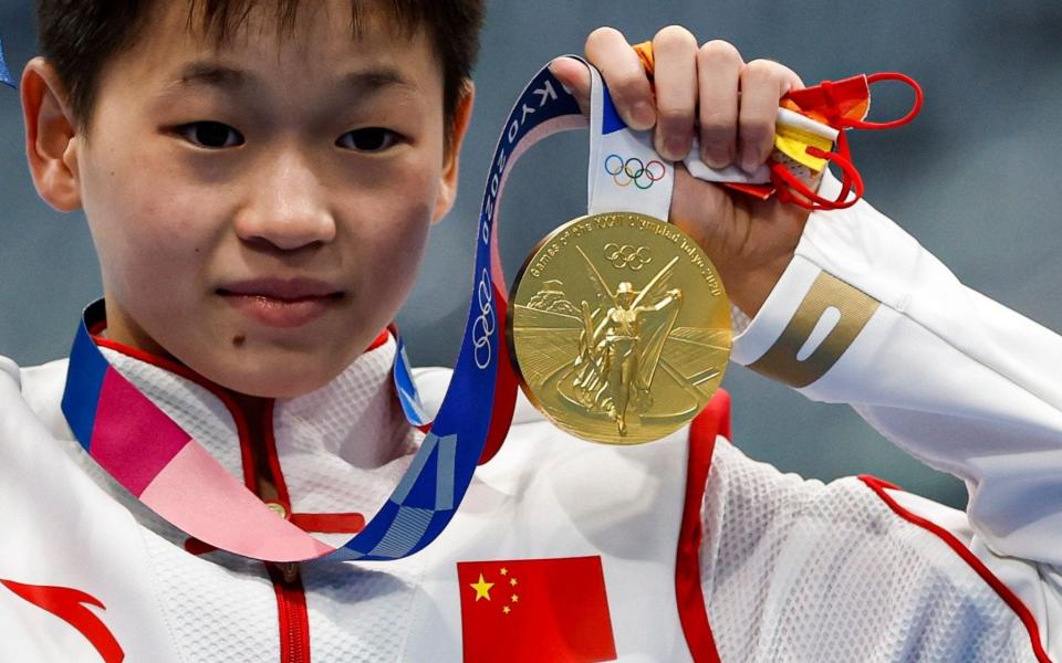 Quan Hongchan poses with her gold medal - SHUTTERSTOCK