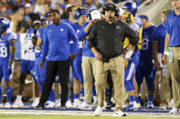 Kentucky head coach Mark Stoops watches the team from the sideline during the first half of an NCAA college football game against Missouri in Lexington, Ky., Saturday, Sept. 11, 2021. (AP Photo/Michael Clubb)