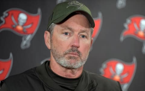 Tampa Bay Buccaneers head coach Dirk Koetter talks to reporters after an NFL football game against the New York Giants in East Rutherford, N.J. Dirk Koetter has been fired as coach of the Tampa Bay Buccaneers. The team made the announcement Sunday night - Credit: AP