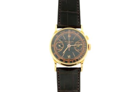 An 18Kt gold gents Patek Philippe Two Register Chronograph watch with a black dial, 2 sub dials, red numerals and a black leather strap, circa 1940s, is pictured in this undated handout photo provided by the U.S. Marshals Service, on February 2, 2016. REUTERS/U.S. Marshals Service/Handout via Reuters