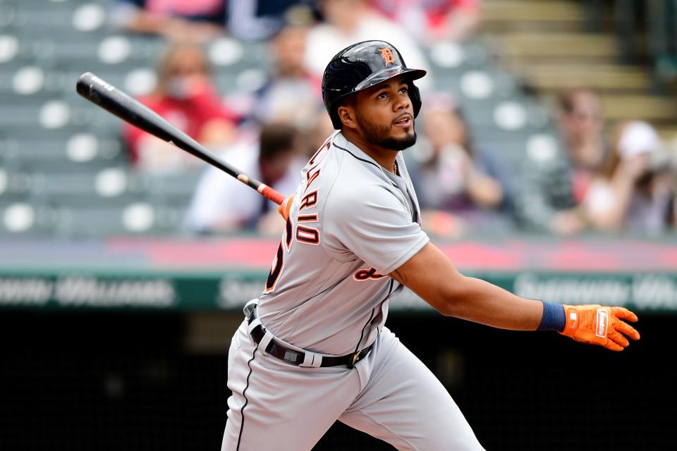 Jeimer Candelario of the Detroit Tigers hits an RBI single in the first inning during a game against the Cleveland Indians at Progressive Field on April 11, 2021, in Cleveland, Ohio.
