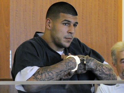 aaron hernandez in handcuffs